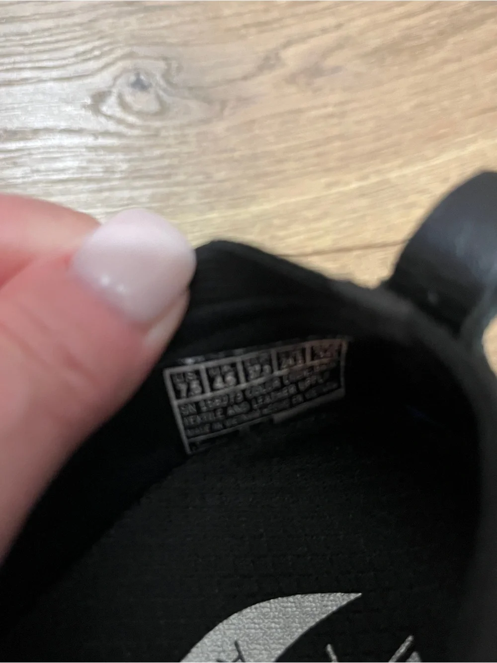SkechersBlack & White Slip-On Knit Sneakers